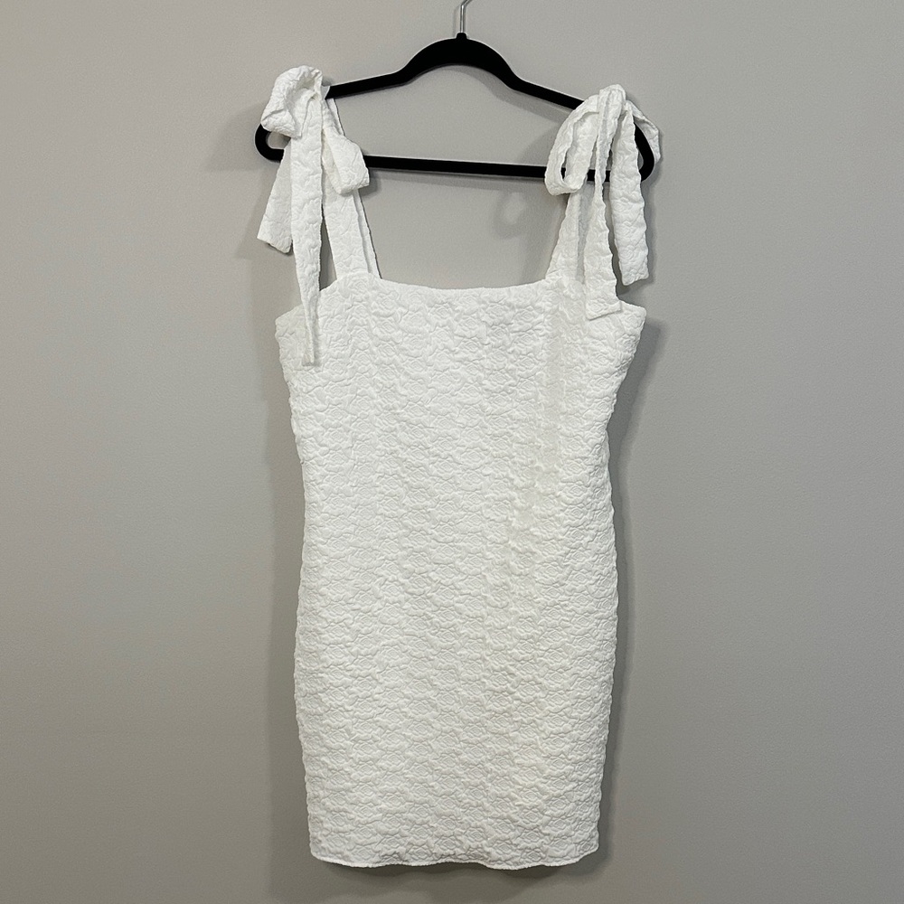 Chic White Textured Mini Dress with Tie Straps